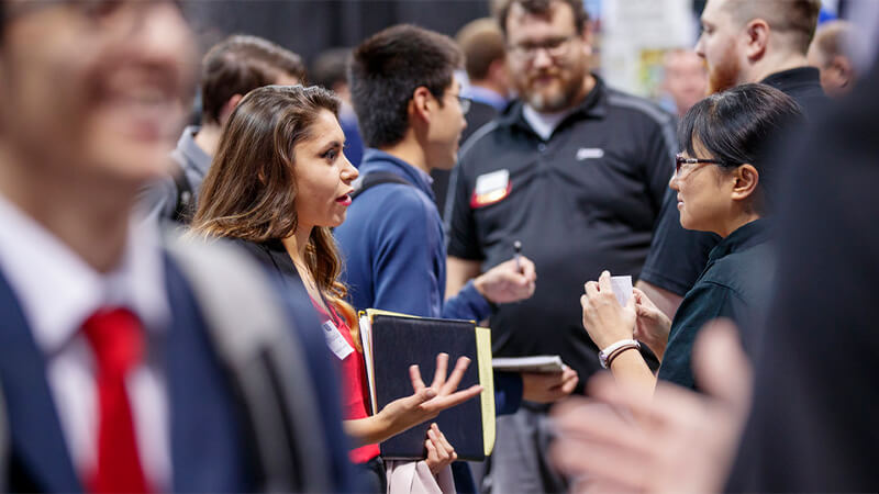 Students meet with employee representatives at UNL Career Fair.